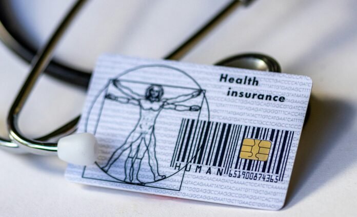 marek-studzinski-Mmx6dI3PVtM-unsplash health insurance